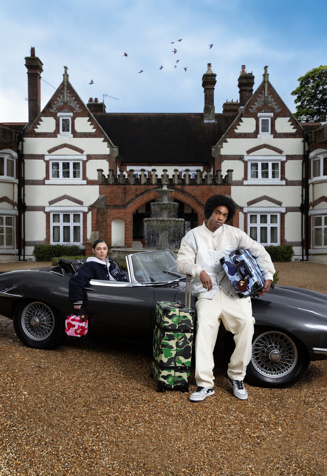 BAPE and Globe-Trotter campaign — models with camo luggage on a Jaguar E-Type outside a manor house, final composite with birds in the sky