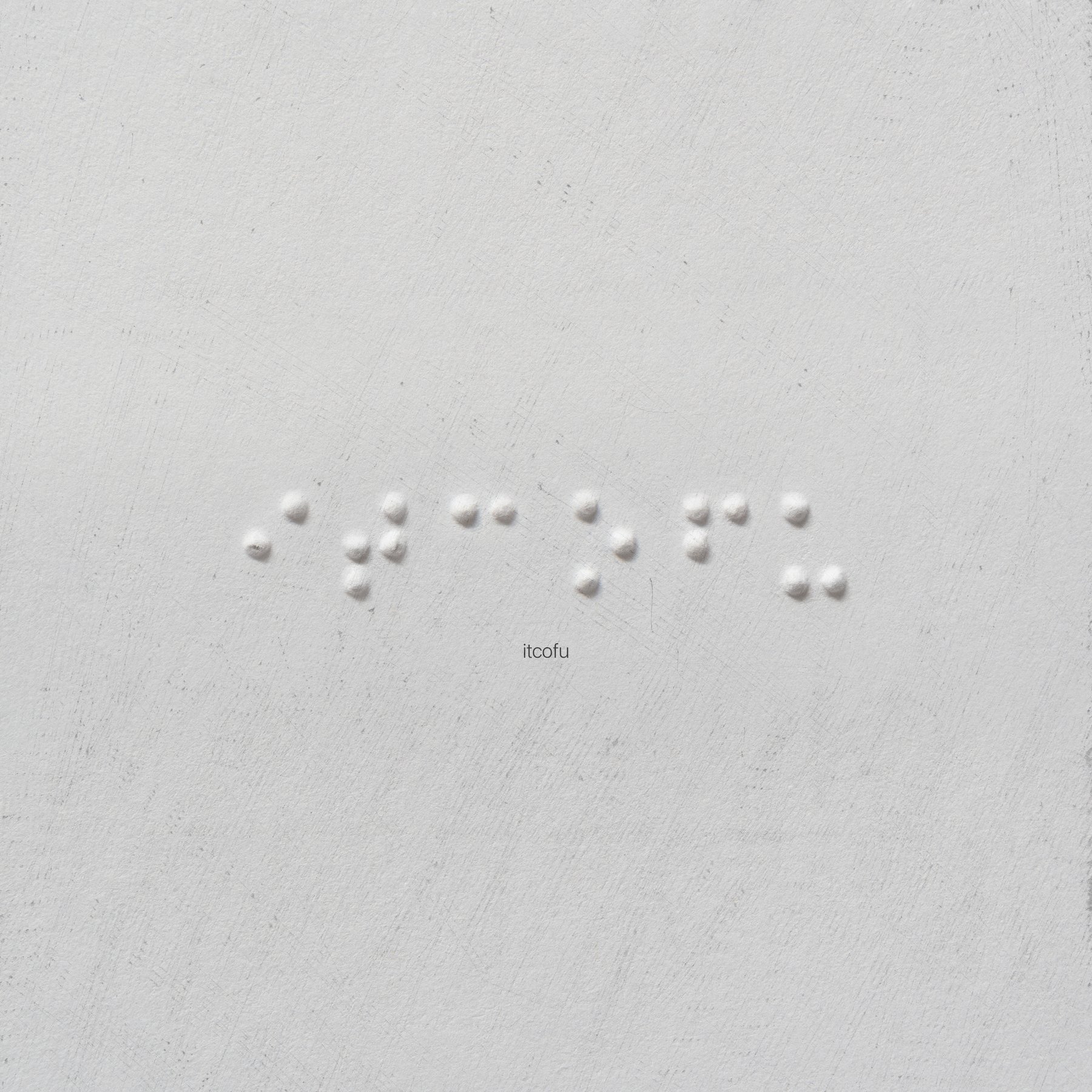 ITCOFU — braille dots embossed in plaster, carousel artwork
