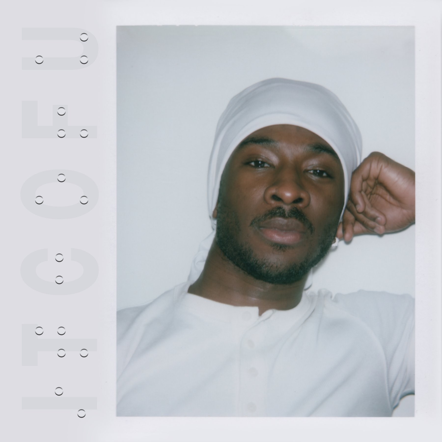 ITCOFU — official single artwork, polaroid portrait of Persy with debossed lettering