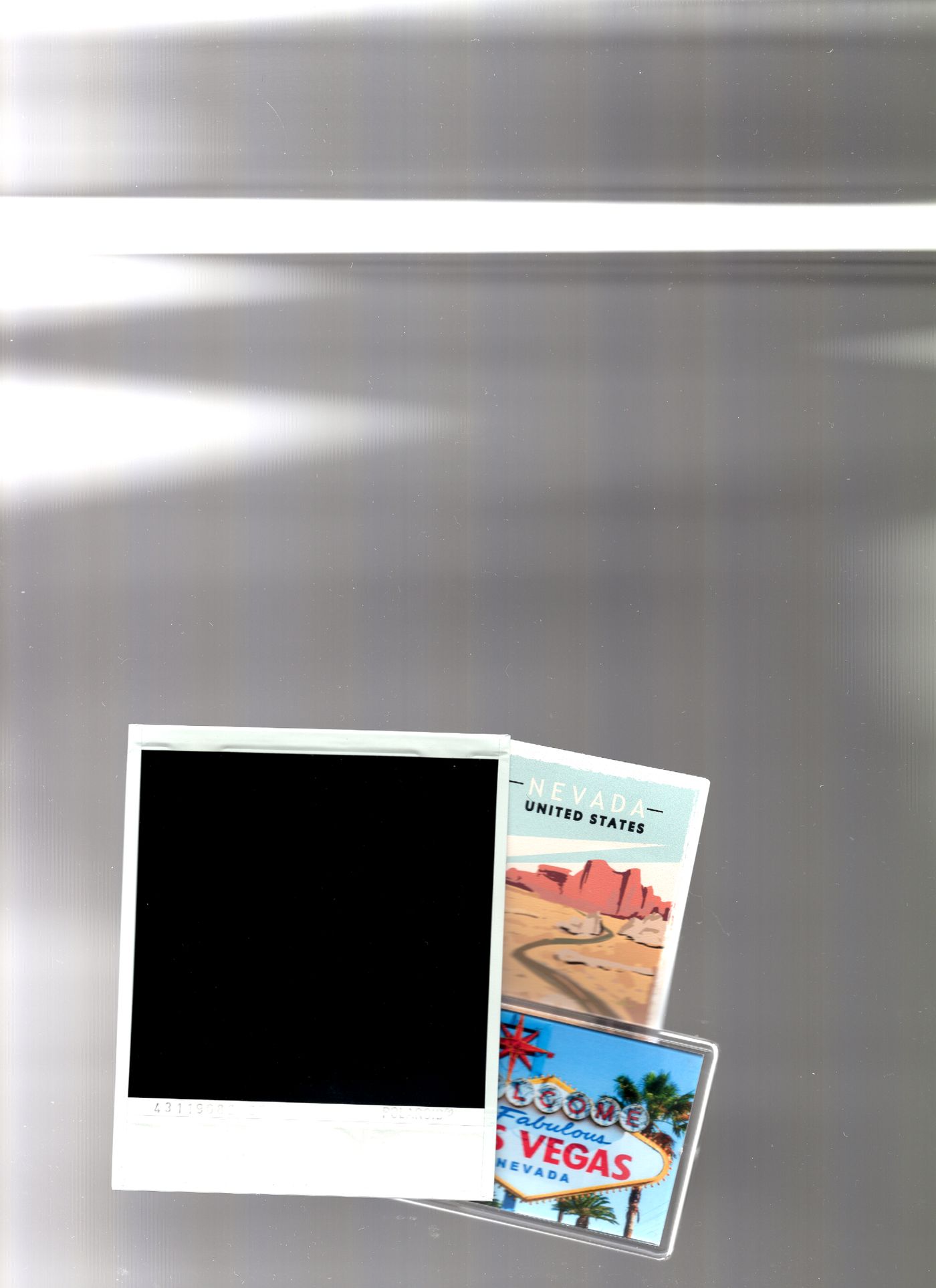 Flatbed scan of poker chips and an LA keyring used in the singles