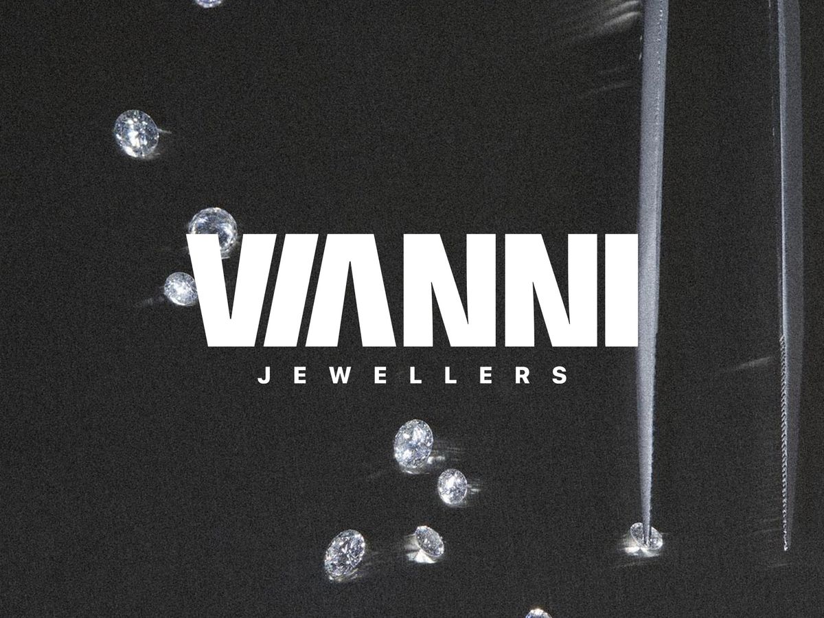 Vianni Jewellers — logotype over loose diamonds