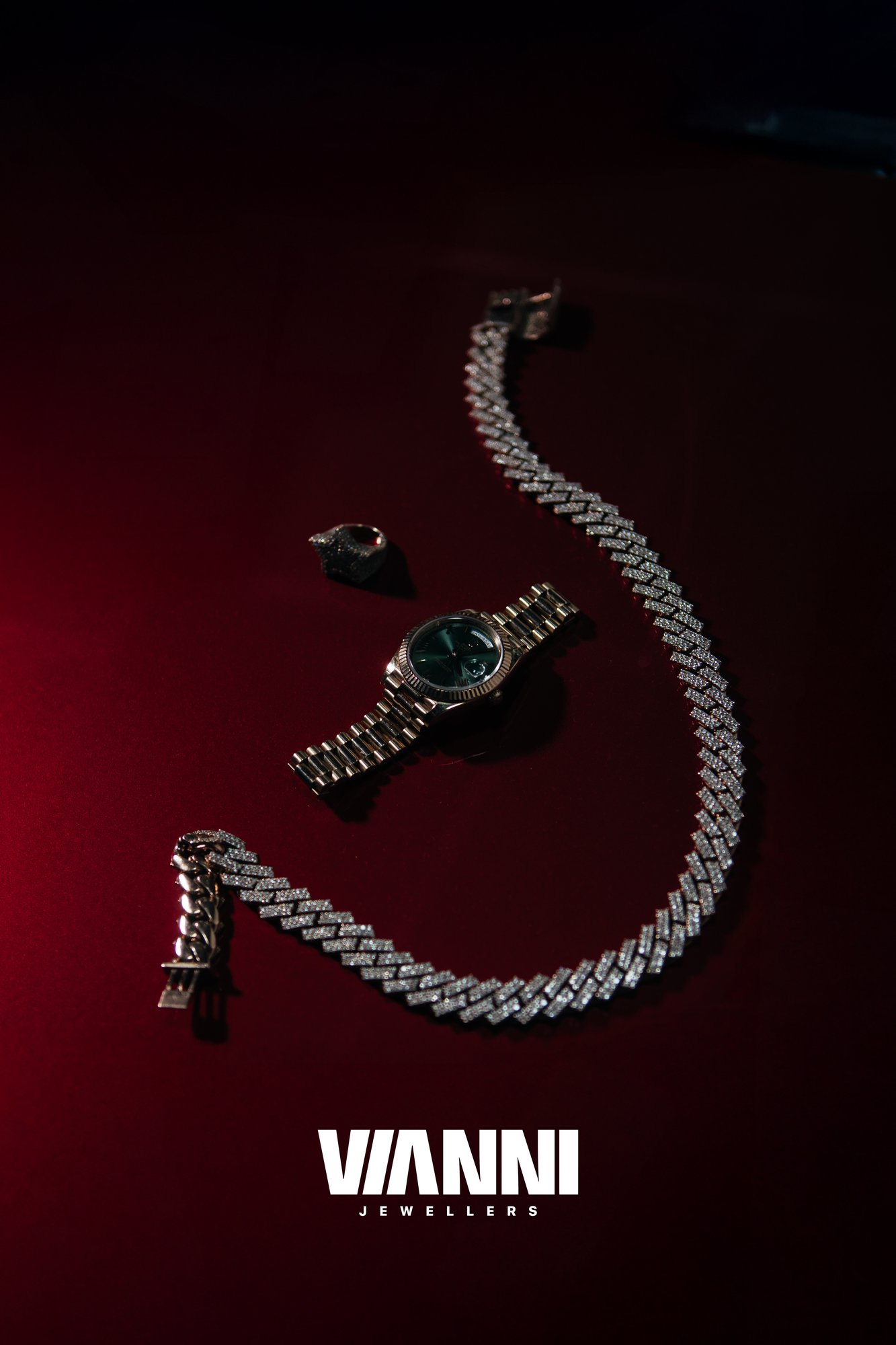 Vianni Jewellers — diamond cuban chain, watch and ring on deep red